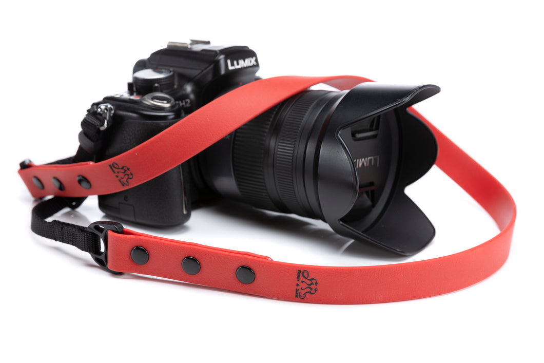 Henry & Sadie 3/4 Red Camera Strap shown on a camera